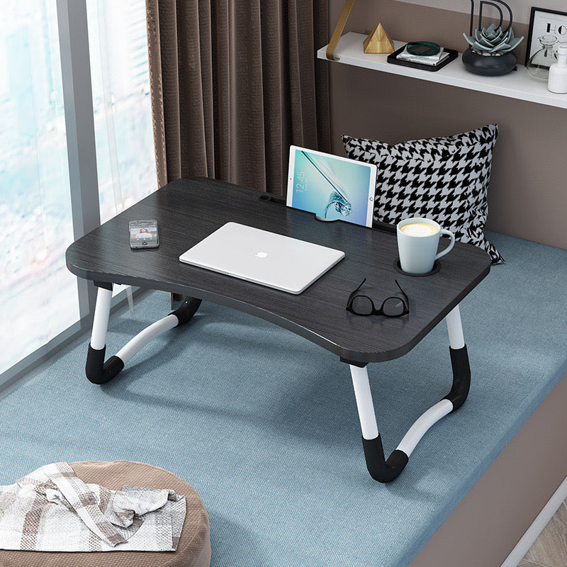 Foldable bed table