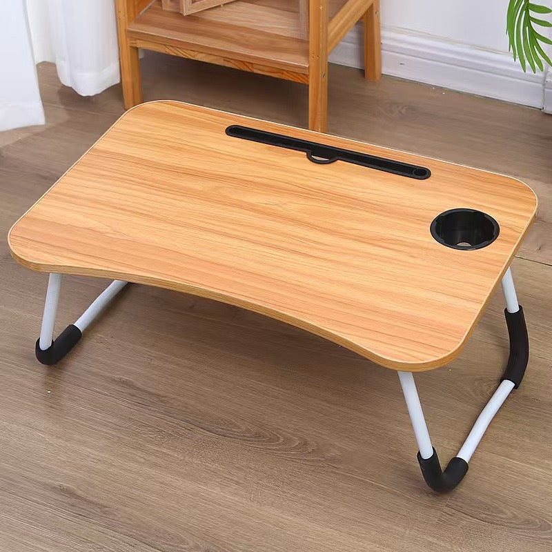 Foldable bed table