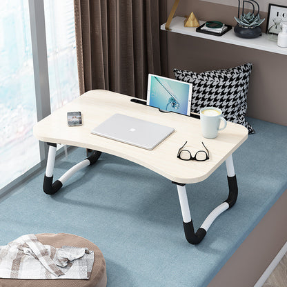 Foldable bed table