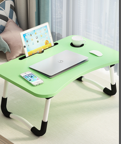 Foldable bed table