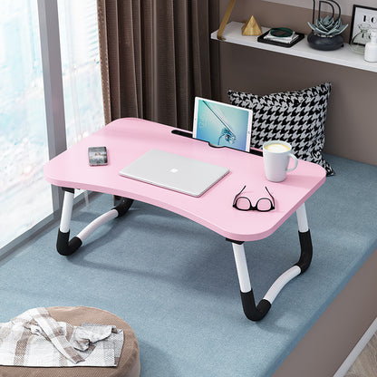 Foldable bed table