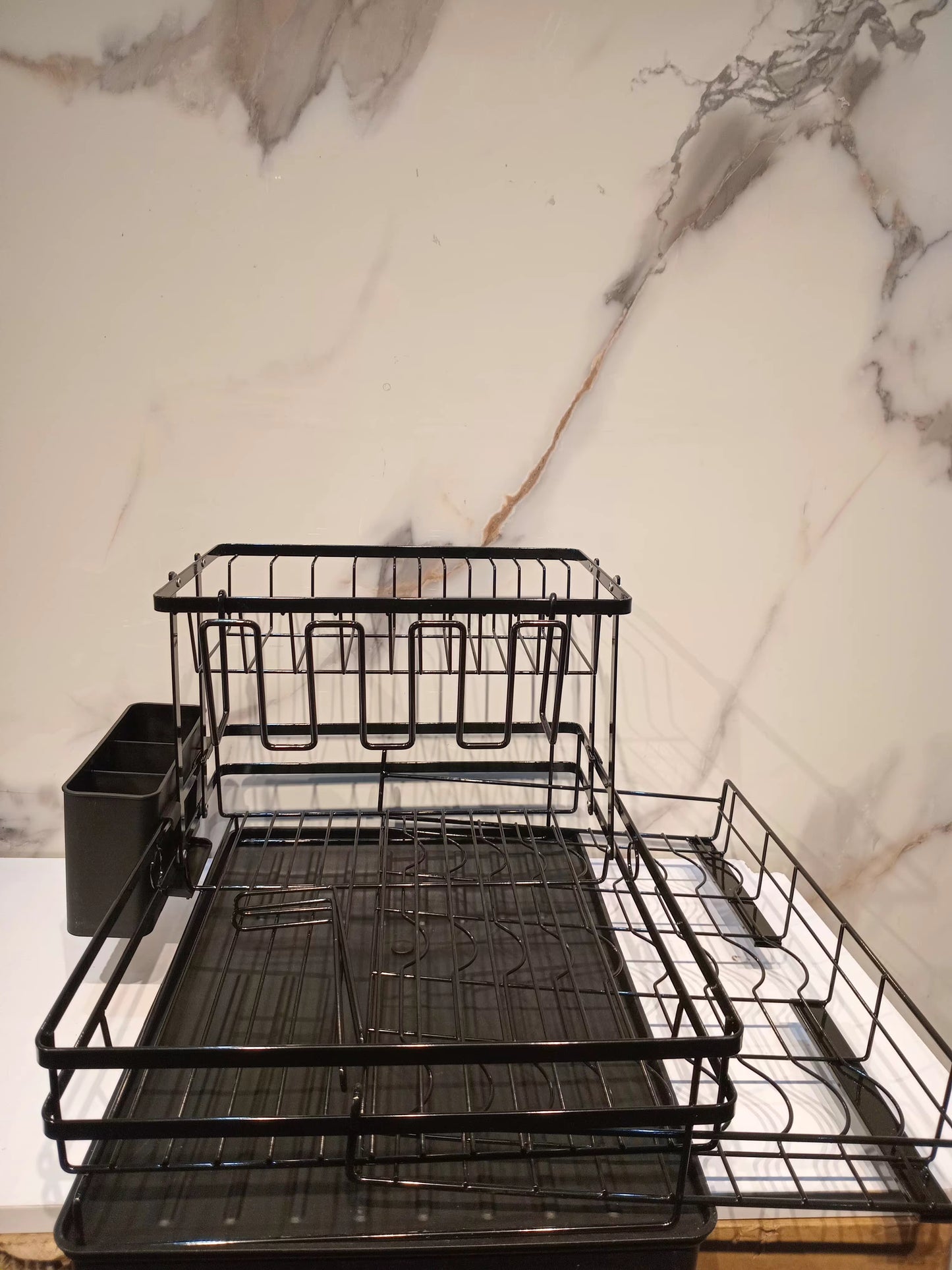 Dish draining rack with extendable bottom